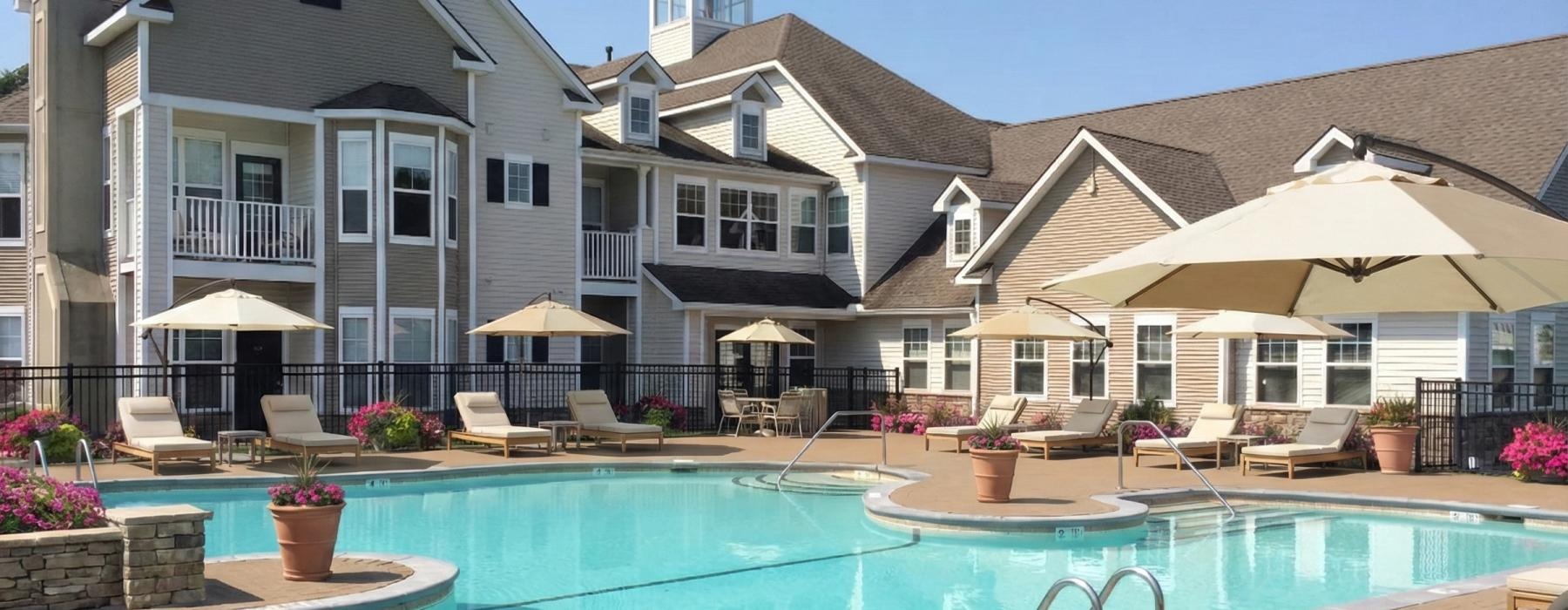 a pool in front of a house