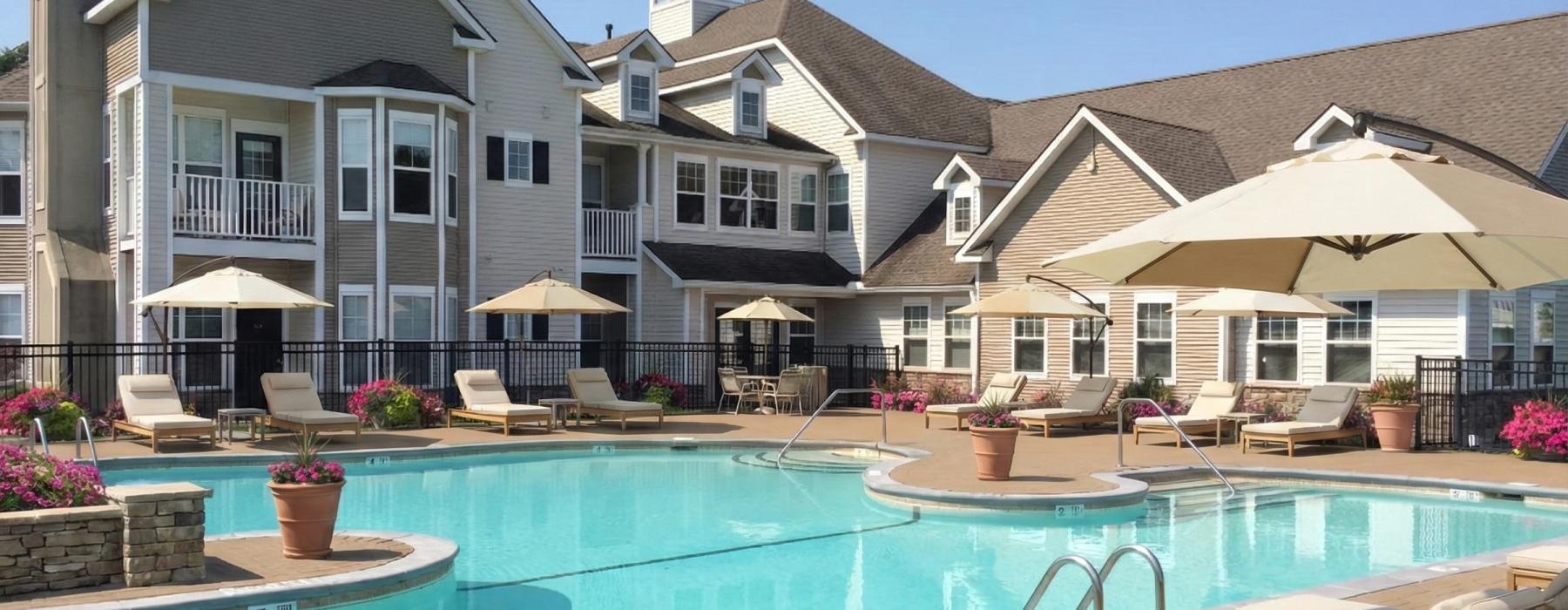a pool in front of a house